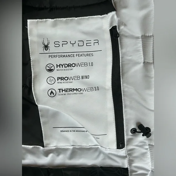 Spyder Women's White and Black long puffer jacket - Picture 13 of 16